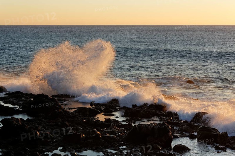 Surf on a rocky coast