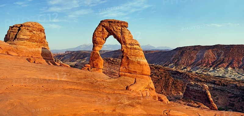 Delicate Arch natural stone arch in front of the La Sal Mountains