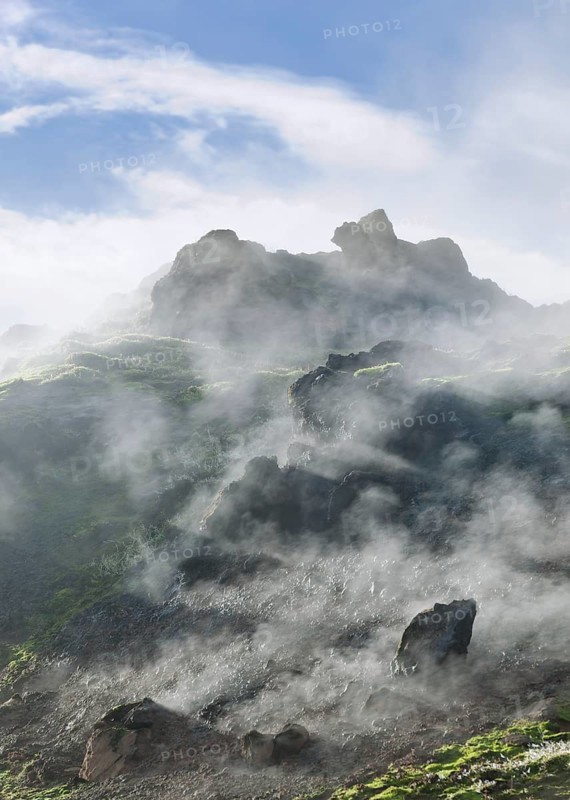 Steam rising from a lava field at the foot of Brennisteinsalda Volcano