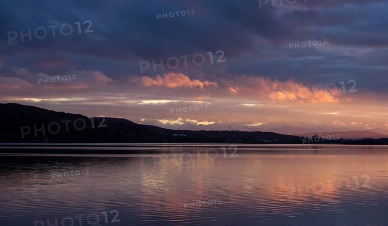 Evening at the lake with mountains