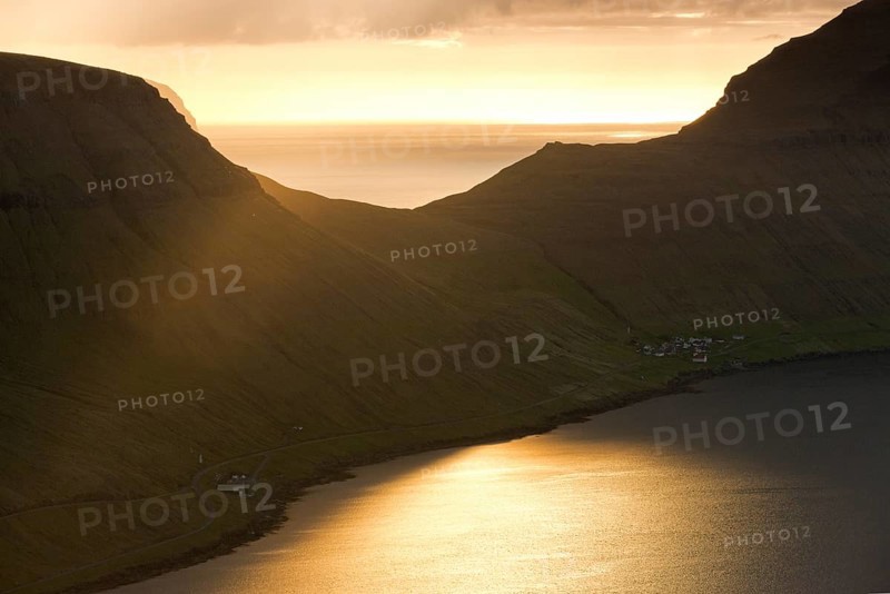 Dramatic mood lighting over the island of Kalsoy