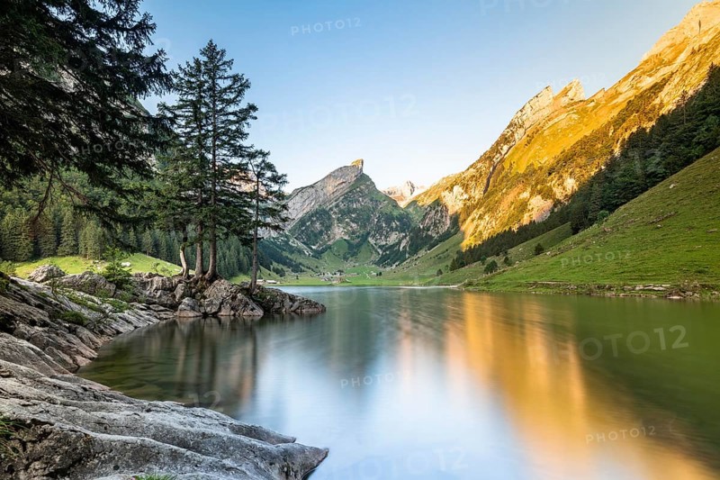 Mountains reflected at sunrise in Lake Seealpsee