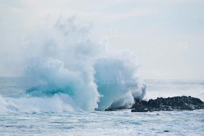 Waves breaking on the shore
