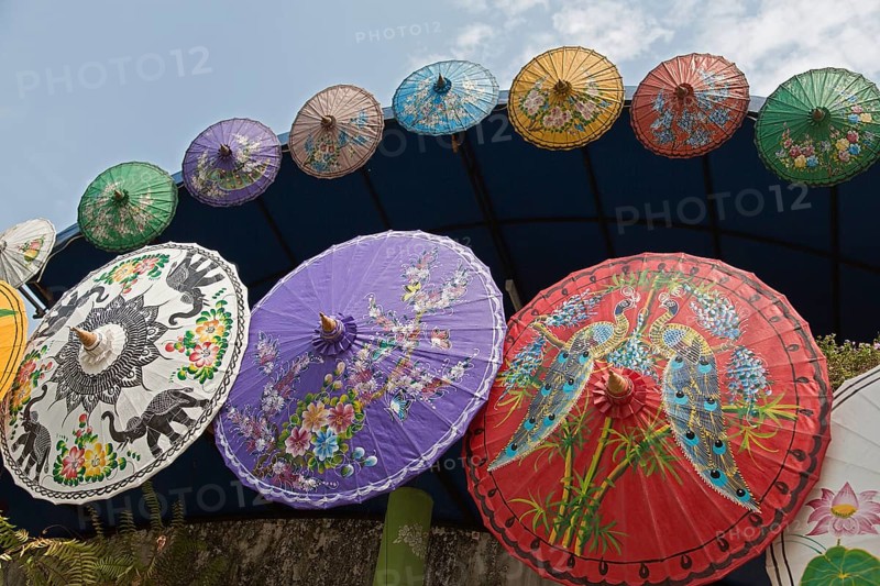 Brightly painted Asian sun umbrellas made of paper