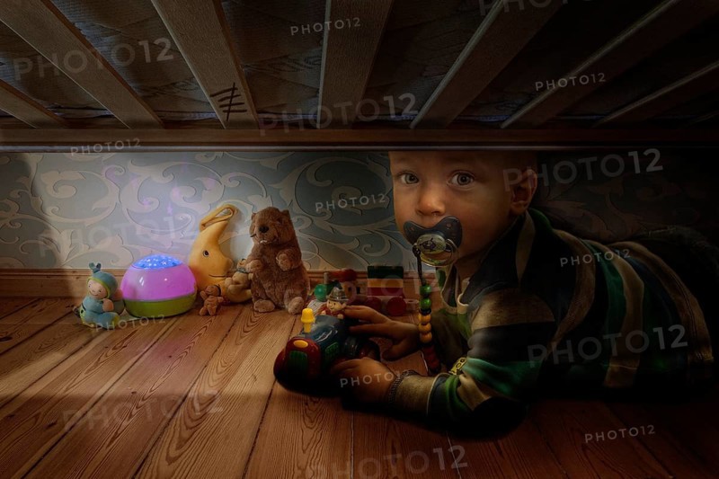 A young boy checking whether all monsters