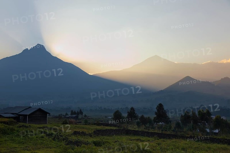 The Virunga volcanoes Mount Mikeno and Mount Karisimbi at sunrise
