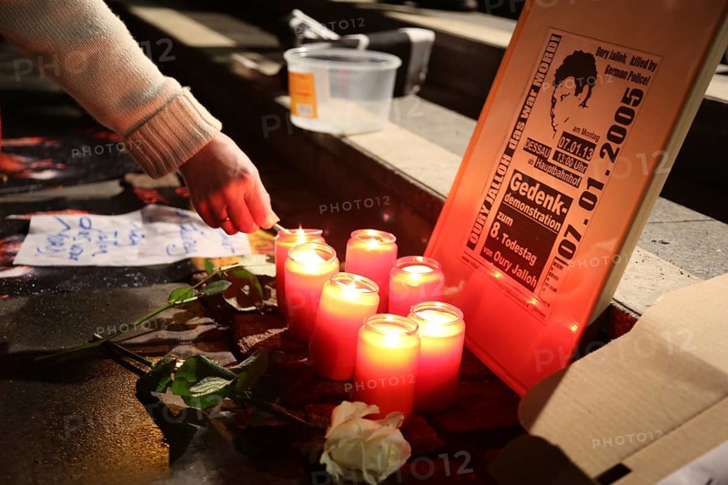 Candles at the commemorative demonstration for the 8th anniversary of the death of Oury Jalloh