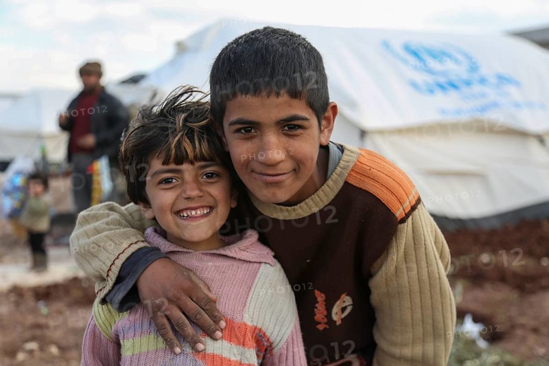 Children in a camp for Syrian refugees of the civil war near the Turkish border