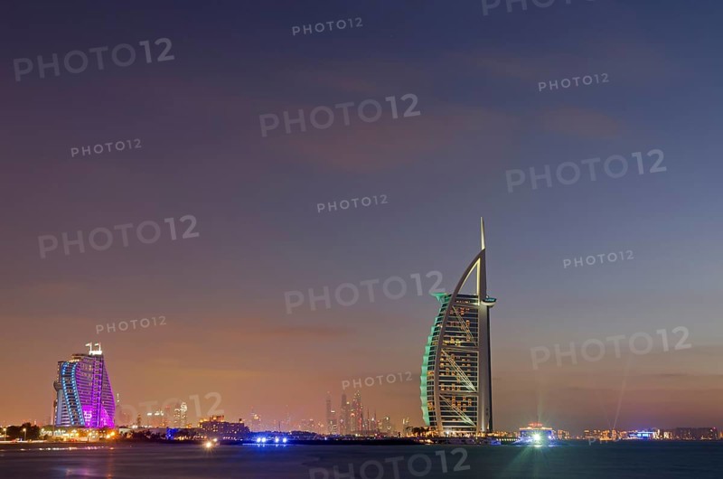 The luxury hotel Burj Al Arab off Jumeirah beach at dusk