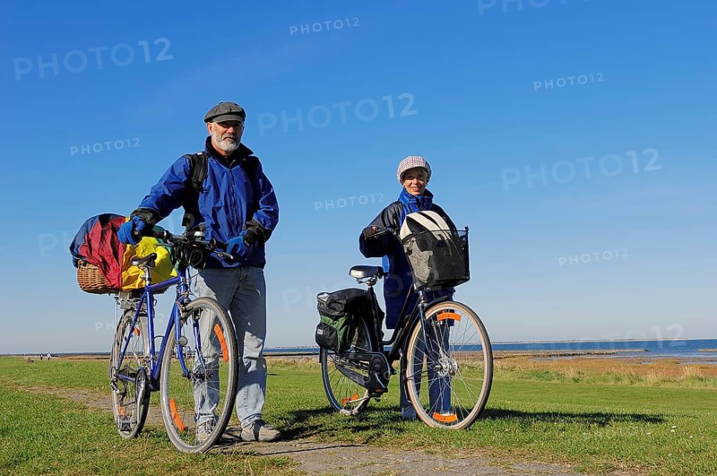 Bicyclists on a dyke