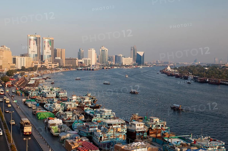 Dubai Creek with old dhows laden with cargo