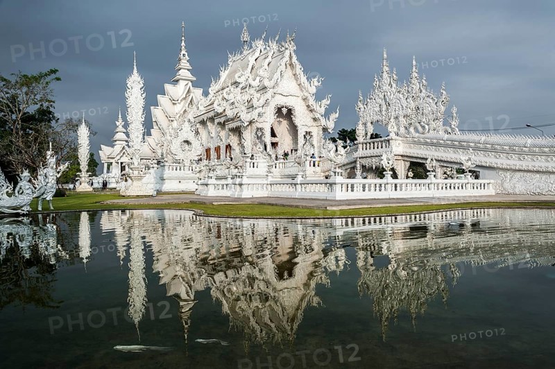 Wat Rong Khun temple or The White Wat with reflection