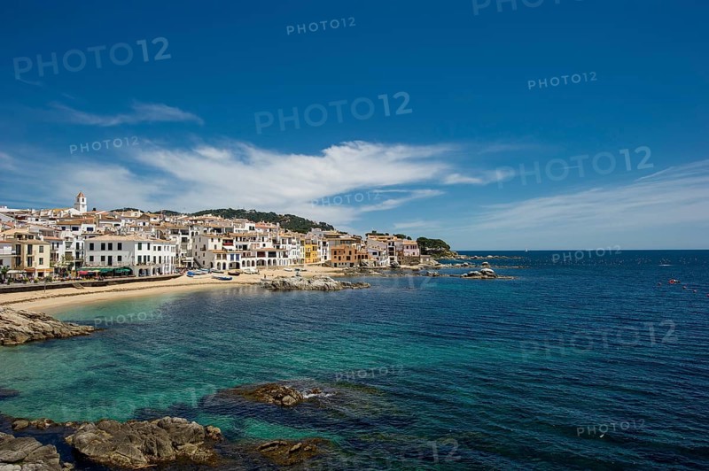Village with a sandy beach on the sea