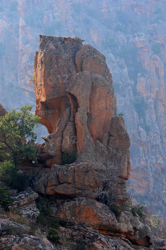The typical bizarre red rocks of the Calanche of Piana. The Calanche of Piana is in the western part of the island Corsica