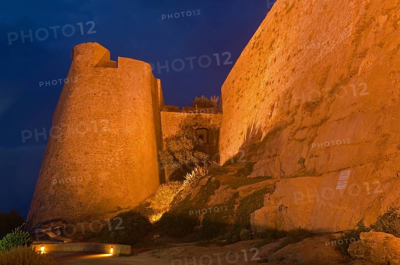 The flood-lit citadel of Calvi at the blue hour after sunset. Calvi is in the department Haute-Corse