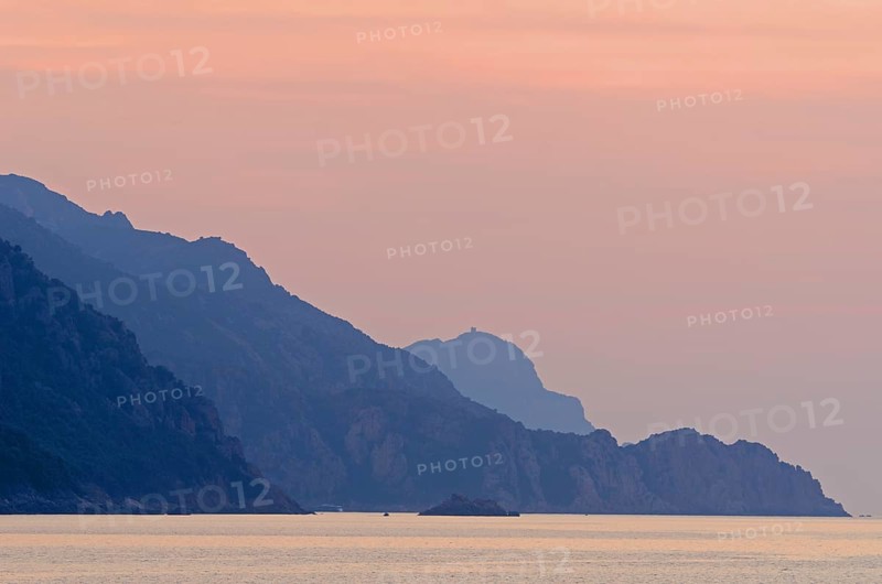 The Gulf of Porto with the surrounding mountains at sunset