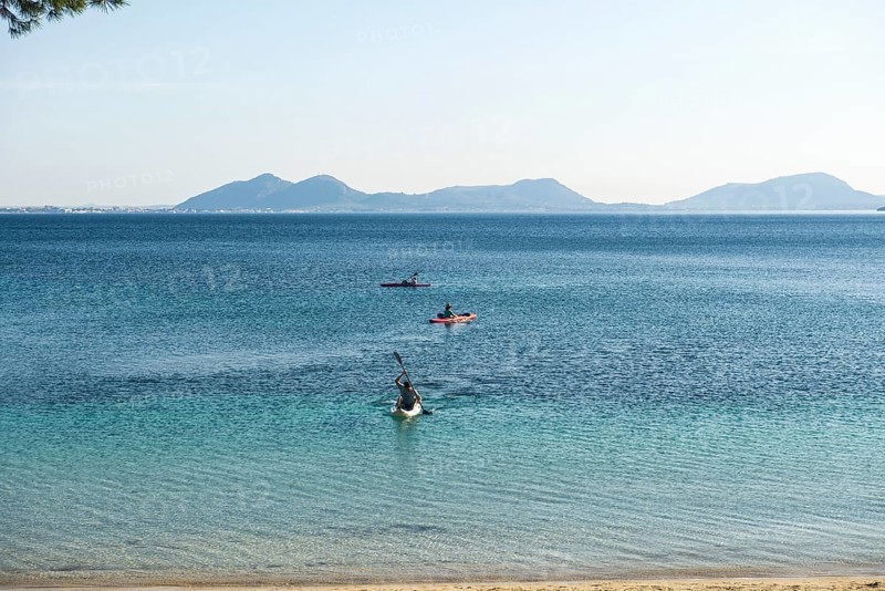 Bay and kayakers