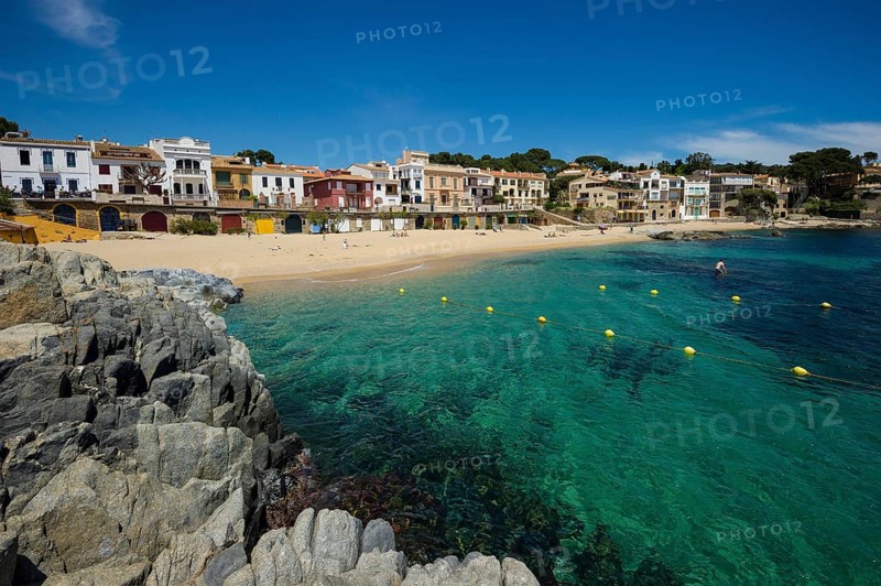 Village with a sandy beach on the sea