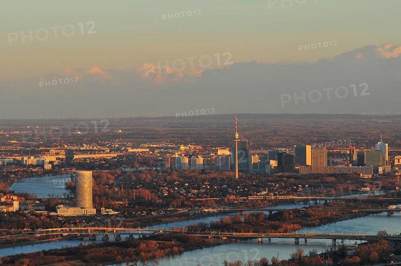 The city of Vienna and the New Danube river at dusk
