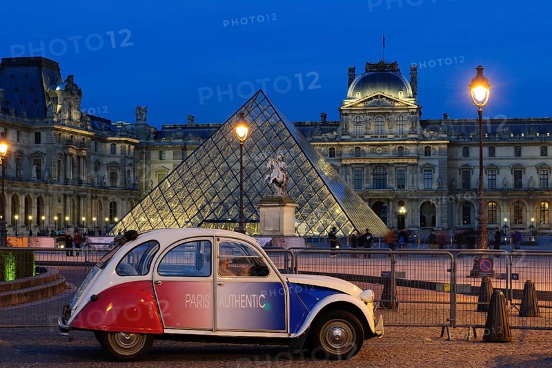 Citroen 2 CV parked front of the Musee du Louvre