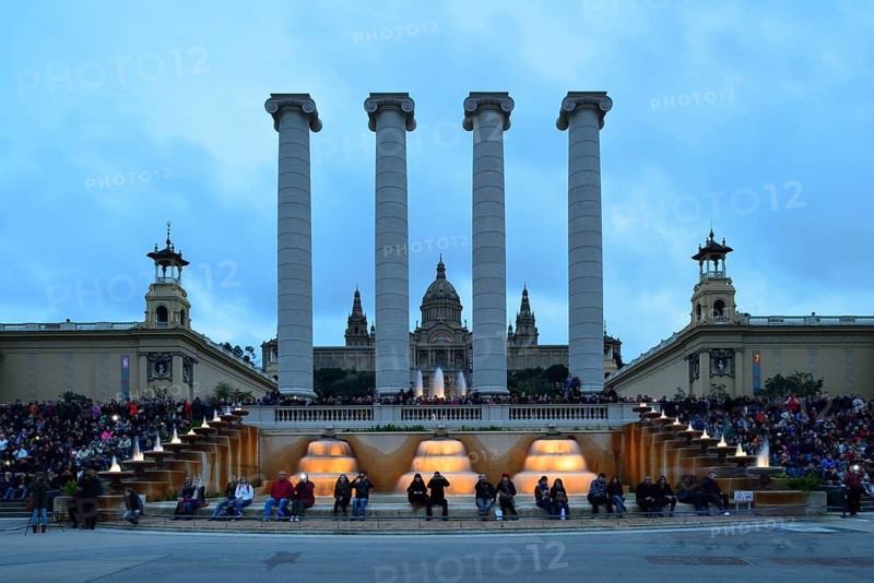 Crowd waiting for the Font Magica magic fountain to light up at dusk