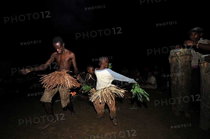 Pygmies of the Bakola people celebrating with song and dance