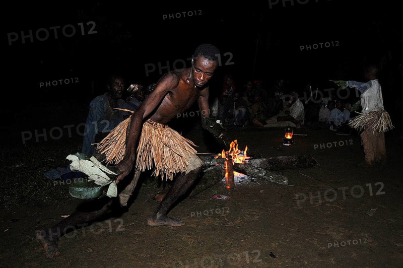 Pygmies of the Bakola people celebrating with song and dance