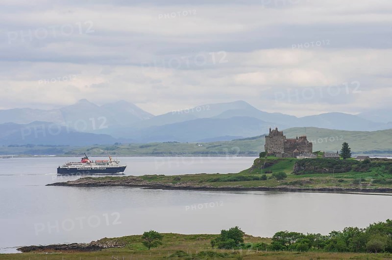 Ferry passing Duart Castle on the west coast