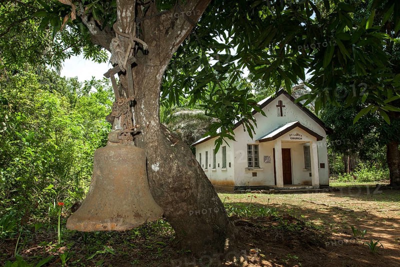 Old bell from the colonial period still used for calling the faithful to the Church of St. Luke