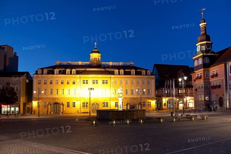 Illuminated City Palace and Town Hall on the market square