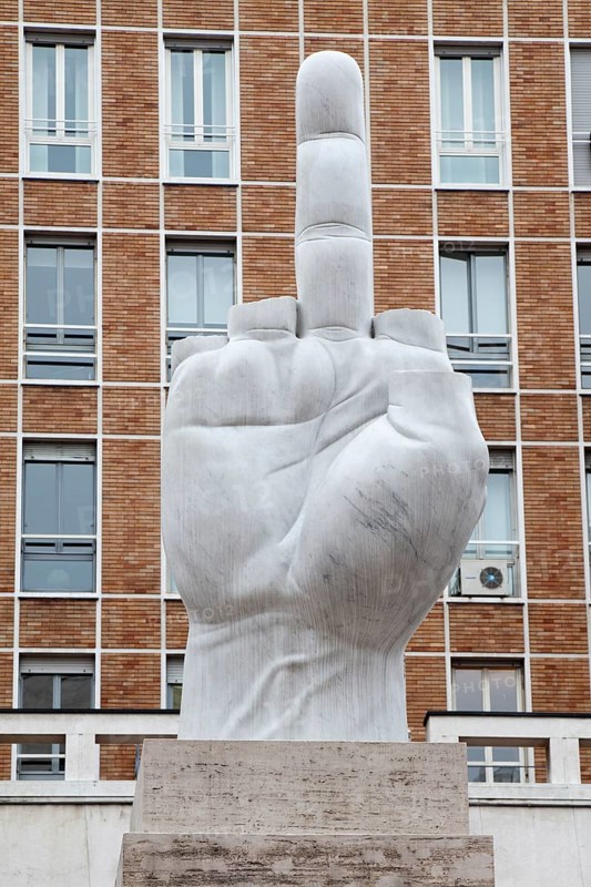 Sculpture 'Crippled Hand' by Maurizio Cattelan at Piazza degli Affari