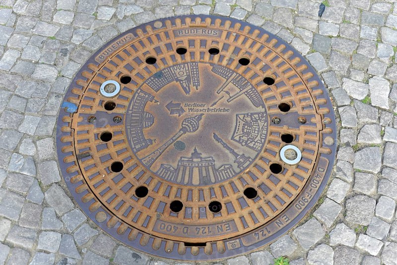 Berlin landmarks depicted on a manhole cover