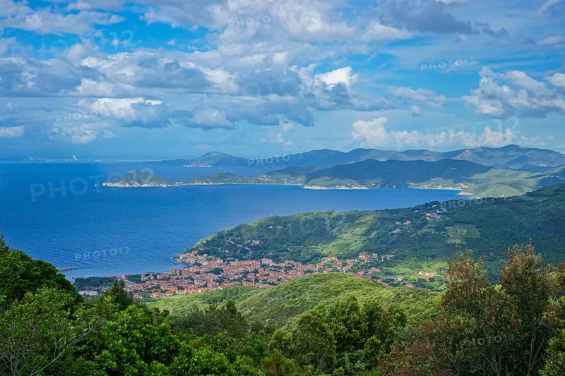 Coast of Elba and town view of Marciana Marina