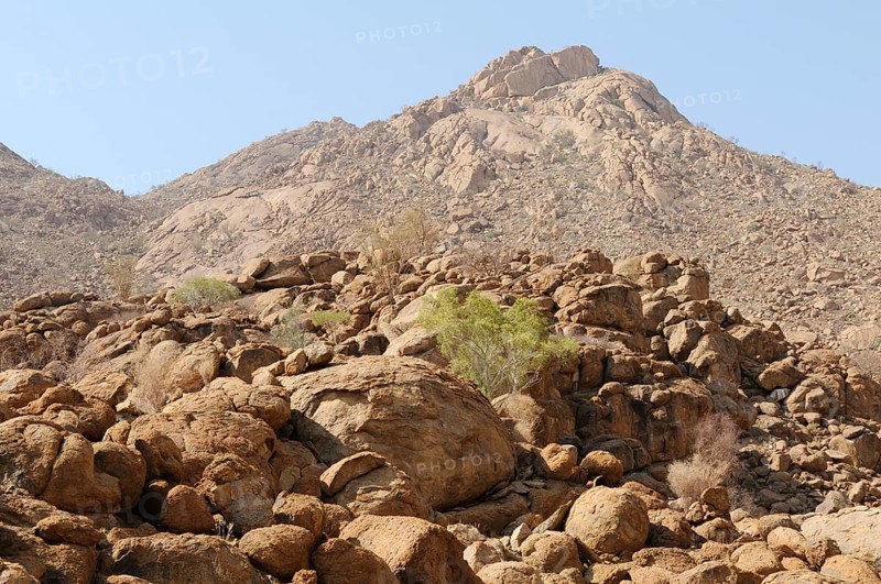 Mountain landscape along a trail to the White Lady rock painting in the Tsisab Gorge