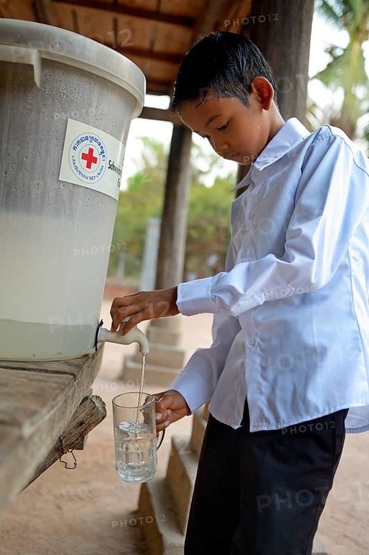 Boy drinking filtered water