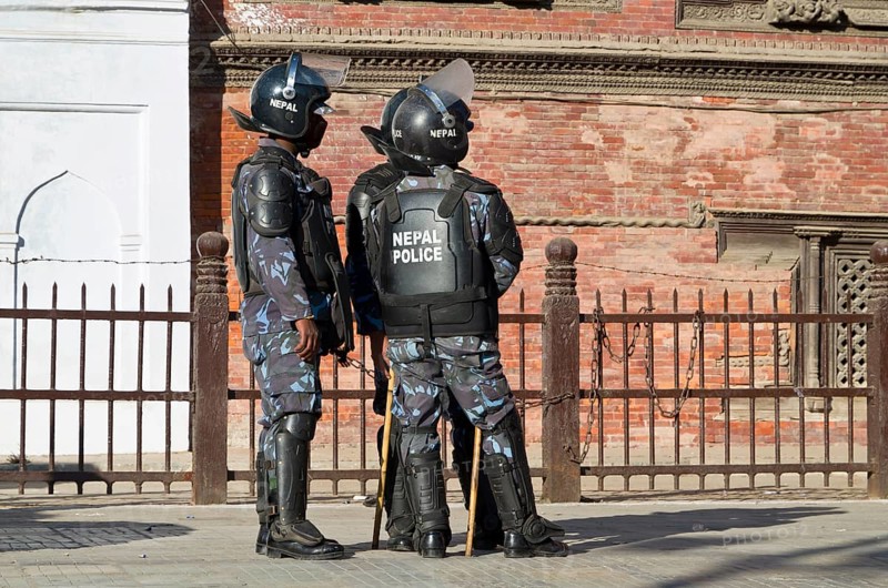 A group of policemen observing a demonstration at Durbar Square
