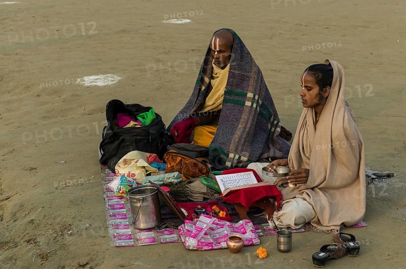 Priest and his daughter meditating