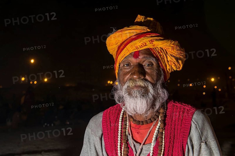 Portrait of a male pilgrim at night at the Sangam