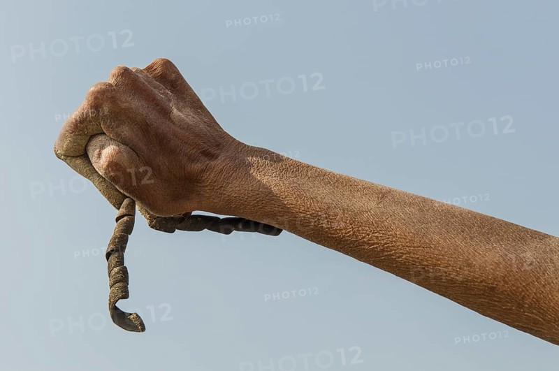 Crippled hand of a Shiva sadhu from Juna Akhara
