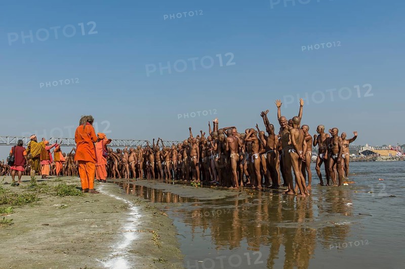 Group of new sadhus standing in the river Ganges