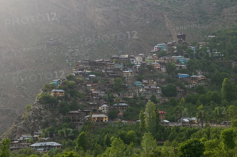 Townscape of Kamru village with Kamru Fort