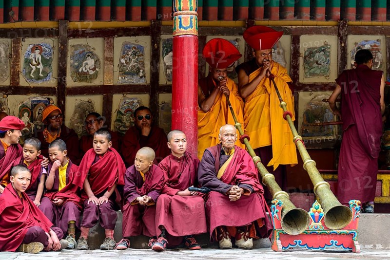 Monks making music as part of the opening ceremony of the Hemis Festival