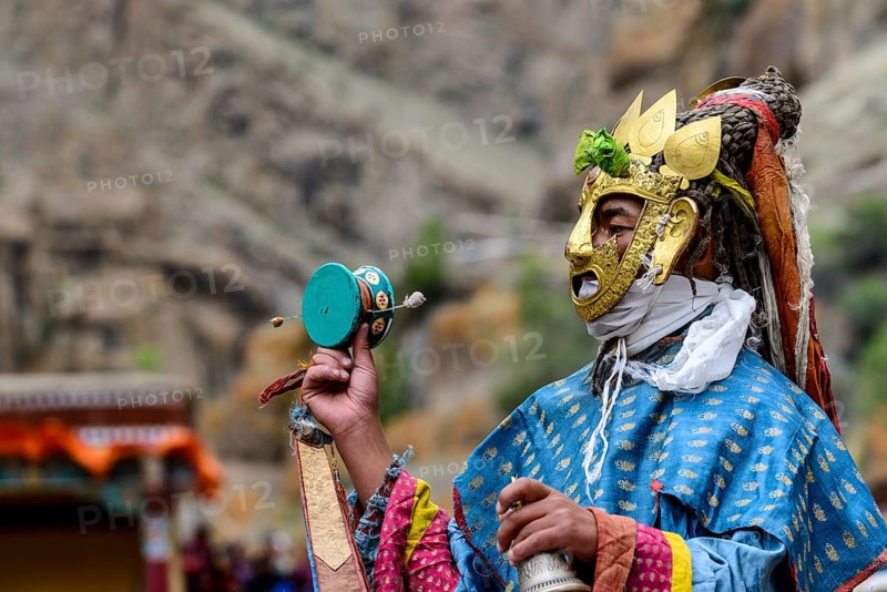 Monk performing ritual mask dance
