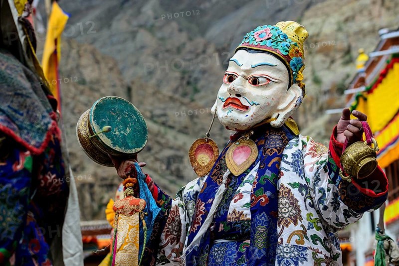 Monk performing ritual mask dance