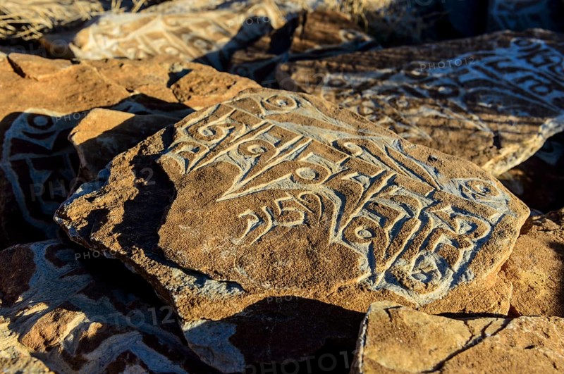 Mani stone with mantra 'Om Mani Padme Hum'