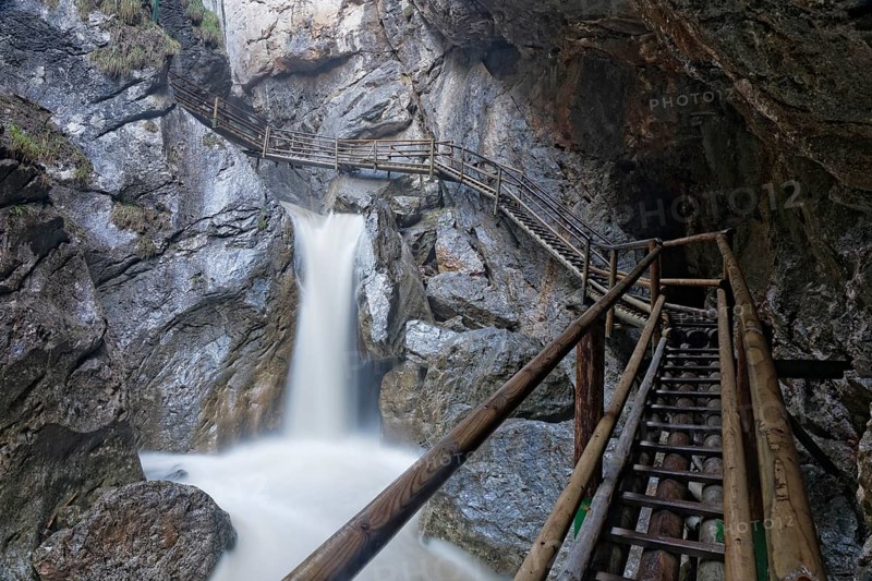 Wooden bridge and a waterfall in Baerenschuetzklamm gorge