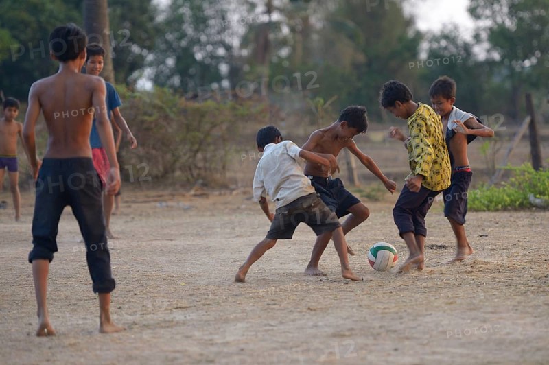 Boys playing football