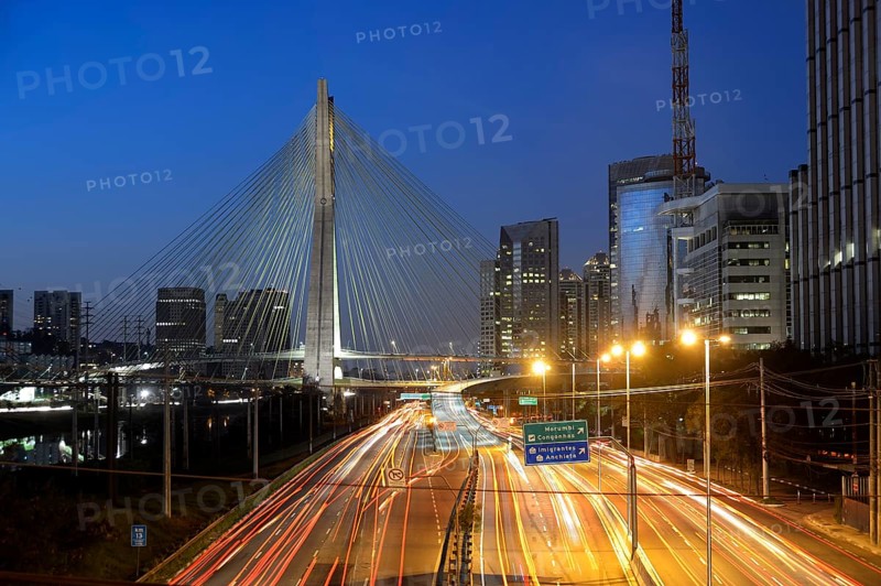 Modern skyscrapers and the Octavio Frias de Oliveira bridge over the Rio Pinheiros River at night