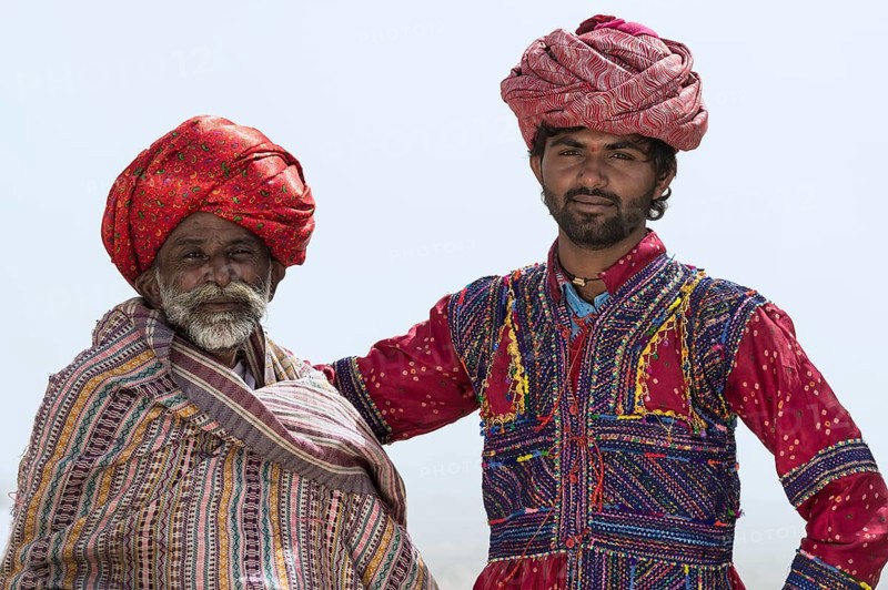 Two Rabari Men in traditional colorful clothes