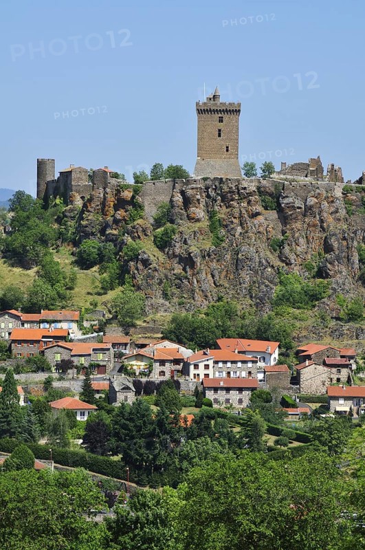 Castle of Polignac on a basalt rock above the village